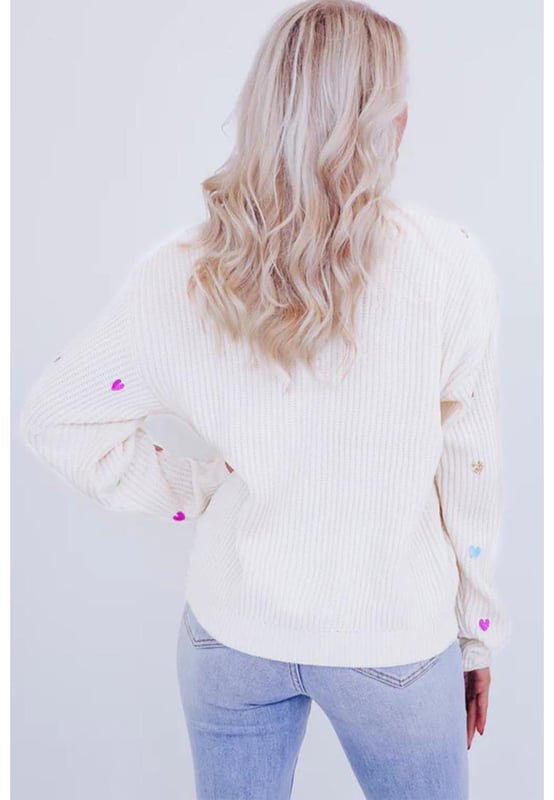 Patrón de corazón en forma de lentejuelas beige  
Tejido de punto tipo waffle suave  
Cuello redondo clásico  
Diseño de corazón con lentejuelas que llama la atención  
Suéter glamuroso ideal para looks casuales  
Material: 50% Viscosa 28% Poliéster 22% Poliamida
