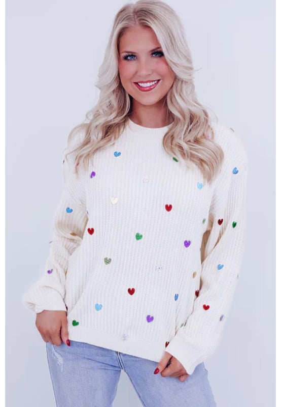 Patrón de corazón en forma de lentejuelas beige  
Tejido de punto tipo waffle suave  
Cuello redondo clásico  
Diseño de corazón con lentejuelas que llama la atención  
Suéter glamuroso ideal para looks casuales  
Material: 50% Viscosa 28% Poliéster 22% Poliamida