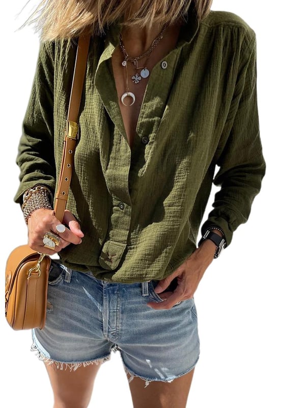 Inspired by vintage fashion
  Crinkle
  textured fabric for a unique and distinctive touch
  Button
  up front for versatile styling options
  Turn
  down collar suitable for both casual and formal occasions
  Available in multiple sizes: S M L XL
Material: 100% Cotton