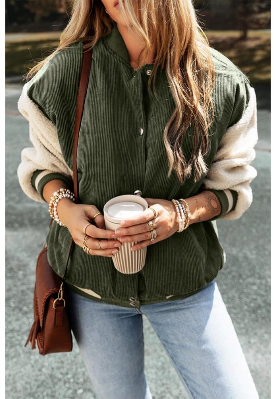 Flat collar
  Varsity
  striped trim
  Snap button
  front closures
  Faux shearling dropped long sleeves
  Elasticized trim
  Pairs well with jeans and casual pants
Material: 100% Polyester