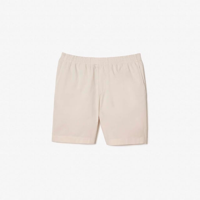 Men's Lacoste Organic Cotton Shorts.- Loose, relaxed fit: Relaxed style.- Elasticated waistband with drawstring: Adjustable, for tailored comfort.- Two pockets on back: Practical and eye-catching.- Crocodile on back pocket: Signed Lacoste.- Organic cotton: Grown without GMO or chemical products. Material: 100% Cotton. Ref: GH7862G7A.