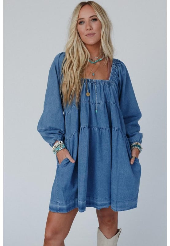 Dusk blue mini dress
  Square neckline for showcasing collarbone and neck accessories
  Loose fit for comfortable wear and relaxed silhouette
  Handy side pockets for a touch of casual style
  Crafted with durable denim for long
  lasting wear
  Available in different sizes. Refer to the size chart for the perfect fit.
Material: 100% Cotton