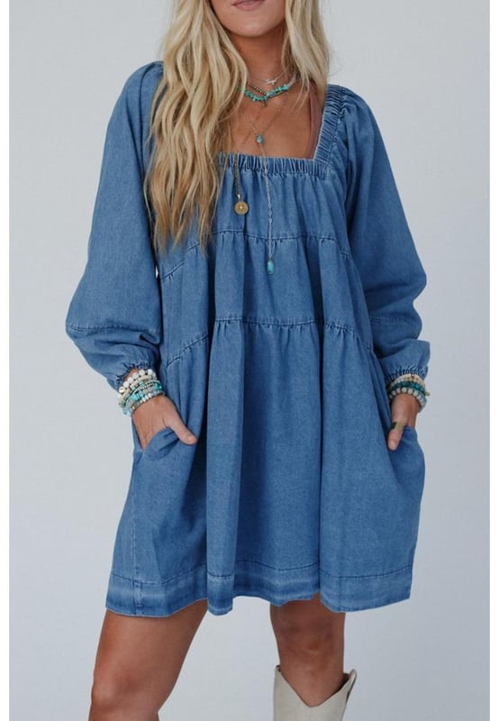 Dusk blue mini dress
  Square neckline for showcasing collarbone and neck accessories
  Loose fit for comfortable wear and relaxed silhouette
  Handy side pockets for a touch of casual style
  Crafted with durable denim for long
  lasting wear
  Available in different sizes. Refer to the size chart for the perfect fit.
Material: 100% Cotton