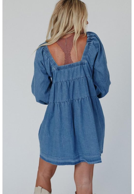Dusk blue mini dress
  Square neckline for showcasing collarbone and neck accessories
  Loose fit for comfortable wear and relaxed silhouette
  Handy side pockets for a touch of casual style
  Crafted with durable denim for long
  lasting wear
  Available in different sizes. Refer to the size chart for the perfect fit.
Material: 100% Cotton