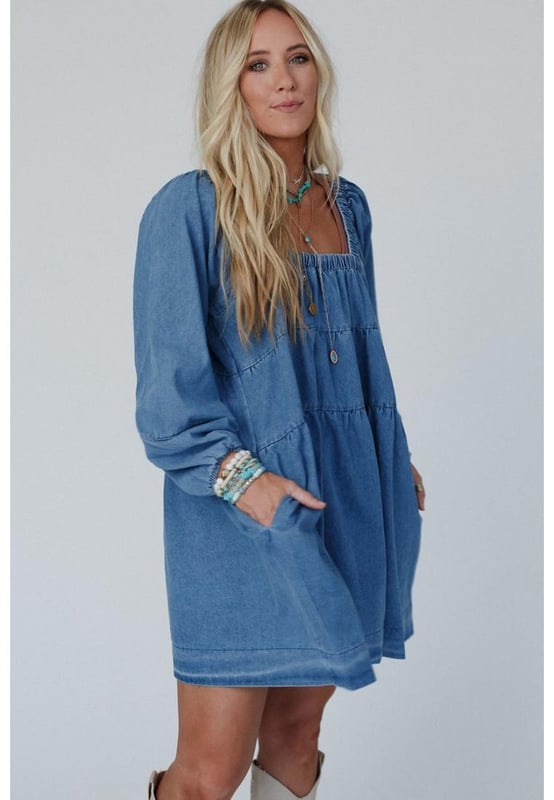 Dusk blue mini dress
  Square neckline for showcasing collarbone and neck accessories
  Loose fit for comfortable wear and relaxed silhouette
  Handy side pockets for a touch of casual style
  Crafted with durable denim for long
  lasting wear
  Available in different sizes. Refer to the size chart for the perfect fit.
Material: 100% Cotton