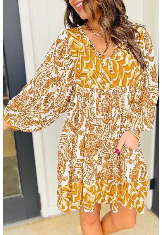 Orange Bohemian Print Puff Sleeve Tied V Neck Flared Mini Dress
  Bohemian paisley print
  Charming puff sleeves
  Tied V
  neckline detail
  Flattering flared silhouette
  Suitable for casual or dressy occasions
  Refer to size chart for perfect fit
Material: 100% Polyester