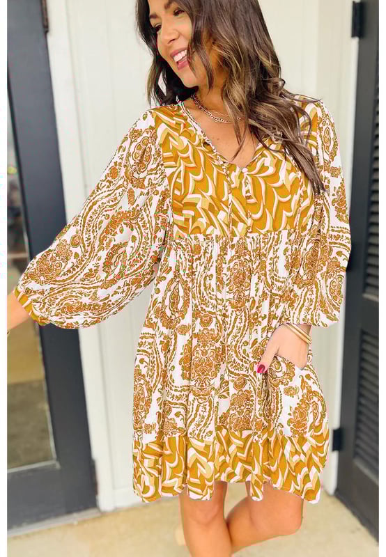 Orange Bohemian Print Puff Sleeve Tied V Neck Flared Mini Dress
  Bohemian paisley print
  Charming puff sleeves
  Tied V
  neckline detail
  Flattering flared silhouette
  Suitable for casual or dressy occasions
  Refer to size chart for perfect fit
Material: 100% Polyester
