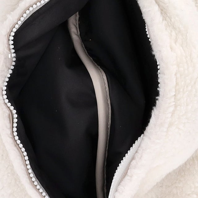VINTAGE, RRP AS NEW
Embrace luxurious winter elegance with the Brunello Cucinelli Frosty Shearling Belt Bag in white sheepskin. This stunning accessory effortlessly combines fashion and functionality, offering a sleek and stylish way to carry your essentials while adding a touch of warmth and texture to any outfit. The plush shearling exterior, paired with the minimalist design, gives this bag an elevated, contemporary appeal that’s both chic and versatile.

Brunello Cucinelli Frosty Shearling Belt Bag in White Sheep Skin

Condition: Excellent
Signs of wear: , No visible sign of wear., No retail tag
Packaging: Dust bag
Color: White | ecru
Material: Sheep skin
Size: One Size | One Size
Measurements: Width: 140; Height: 200; Length: 500; Strap length: 640
SKU: NAPPUDEBA460105W