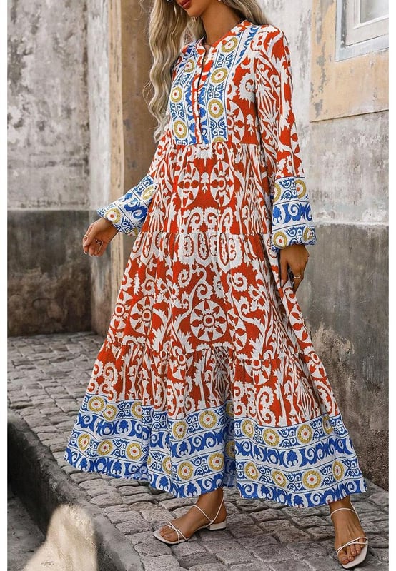 Boho
  inspired geometric prints for a cultural and colorful vibe
  Long sleeves and a split neck add elegance
  Maxi length with a flattering flared silhouette
  Perfect for pairing with sandals or heels for a summer look
Material: 100% Polyester