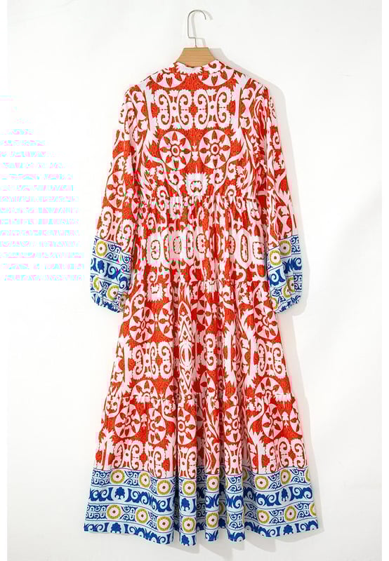 Boho
  inspired geometric prints for a cultural and colorful vibe
  Long sleeves and a split neck add elegance
  Maxi length with a flattering flared silhouette
  Perfect for pairing with sandals or heels for a summer look
Material: 100% Polyester