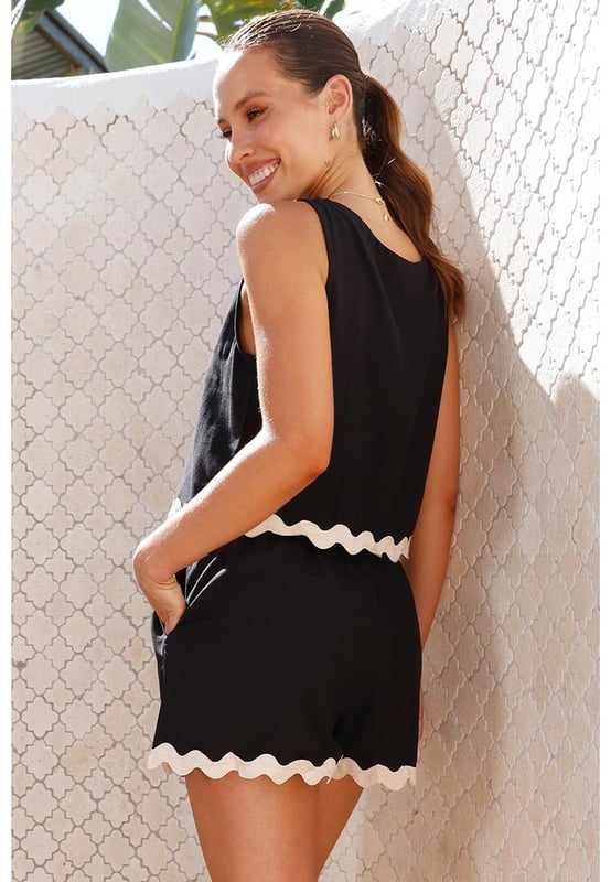 Black Ricrac Trim Tank Top Elastic Waist Shorts Set
  Unique and delicate ricrac detail
  Vest and shorts can be worn together or separately
  Contrast trim creates a color block effect
  Breathable lightweight and comfortable material
  Perfect for your summer wardrobe