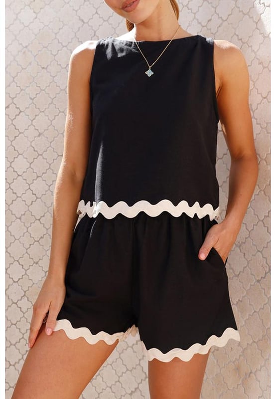 Black Ricrac Trim Tank Top Elastic Waist Shorts Set
  Unique and delicate ricrac detail
  Vest and shorts can be worn together or separately
  Contrast trim creates a color block effect
  Breathable lightweight and comfortable material
  Perfect for your summer wardrobe