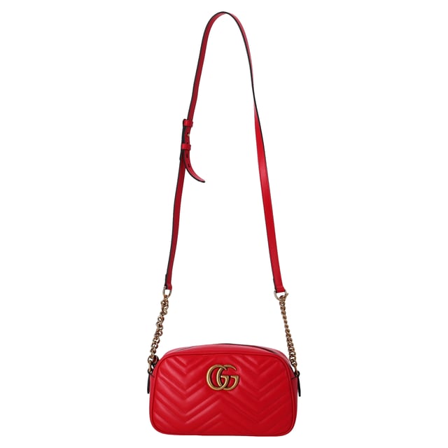 VINTAGE, RRP AS NEW
The Gucci Small GG Marmont Camera Crossbody Bag in Red Leather is a bold, luxurious accessory that embodies both style and practicality. Crafted from rich, quilted red leather, this bag features the iconic GG logo plaque on the front, adding a touch of timeless elegance. The crossbody strap offers hands-free convenience while ensuring comfort throughout the day. Its compact yet spacious design makes it ideal for carrying your essentials in style, whether you're heading out for a day in the city or a night out on the town.

Styling Tip: Pair this striking red crossbody bag with a simple monochrome outfit to let the bag take center stage. For a more polished look, combine it with a tailored blazer, skinny jeans, and ankle boots. Alternatively, for a more casual vibe, wear it with a relaxed t-shirt and denim skirt or pants. The red leather adds a bold pop of color to both neutral and vibrant outfits, making it a versatile and eye-catching addition to any wardrobe.

Gucci Small GG Marmont Camera Crossbody Bag in Red Leather


Condition: Excellent
Signs of wear: No retail tag, No visible sign of wear., 
Packaging: None
Color: Red 
Material: Leather | leather
Size: One Size | One Size
Measurements: Width: 70; Height: 150; Length: 240; Strap length: 1260
SKU: NAPPUDEBA458420W