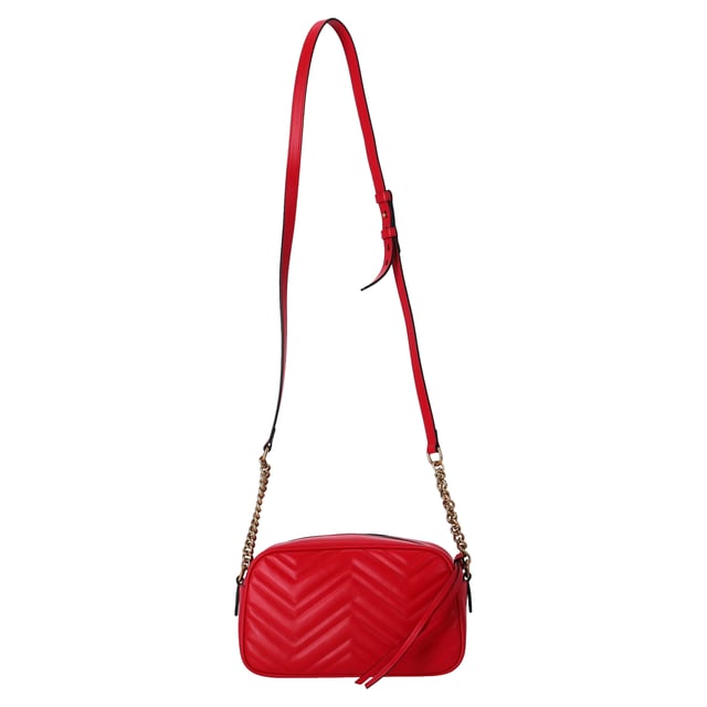 VINTAGE, RRP AS NEW
The Gucci Small GG Marmont Camera Crossbody Bag in Red Leather is a bold, luxurious accessory that embodies both style and practicality. Crafted from rich, quilted red leather, this bag features the iconic GG logo plaque on the front, adding a touch of timeless elegance. The crossbody strap offers hands-free convenience while ensuring comfort throughout the day. Its compact yet spacious design makes it ideal for carrying your essentials in style, whether you're heading out for a day in the city or a night out on the town.

Styling Tip: Pair this striking red crossbody bag with a simple monochrome outfit to let the bag take center stage. For a more polished look, combine it with a tailored blazer, skinny jeans, and ankle boots. Alternatively, for a more casual vibe, wear it with a relaxed t-shirt and denim skirt or pants. The red leather adds a bold pop of color to both neutral and vibrant outfits, making it a versatile and eye-catching addition to any wardrobe.

Gucci Small GG Marmont Camera Crossbody Bag in Red Leather


Condition: Excellent
Signs of wear: No retail tag, No visible sign of wear., 
Packaging: None
Color: Red 
Material: Leather | leather
Size: One Size | One Size
Measurements: Width: 70; Height: 150; Length: 240; Strap length: 1260
SKU: NAPPUDEBA458420W