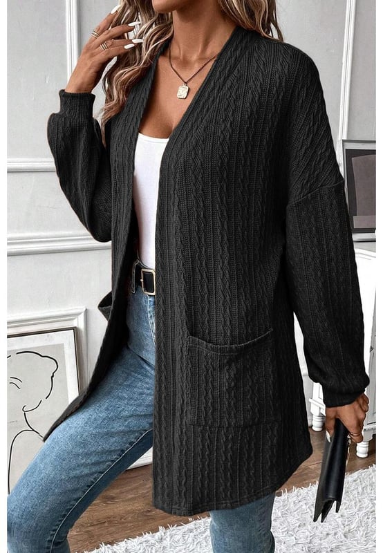 Cardigan Abierto de Punto Texturizado Negro con Bolsillos Laterales  
El punto texturizado combina calidez y moda sin esfuerzo  
Perfecto para la transición entre estaciones  
El cardigan abierto añade un toque chic a cualquier atuendo  
Los bolsillos laterales aportan estilo y practicidad a tu look  
Disponible en múltiples tamaños  
Alta elasticidad para un ajuste cómodo  
Material: 97% Poliéster 3% Elastano