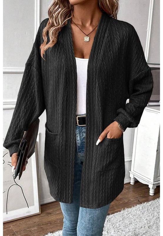 Cardigan Abierto de Punto Texturizado Negro con Bolsillos Laterales  
El punto texturizado combina calidez y moda sin esfuerzo  
Perfecto para la transición entre estaciones  
El cardigan abierto añade un toque chic a cualquier atuendo  
Los bolsillos laterales aportan estilo y practicidad a tu look  
Disponible en múltiples tamaños  
Alta elasticidad para un ajuste cómodo  
Material: 97% Poliéster 3% Elastano