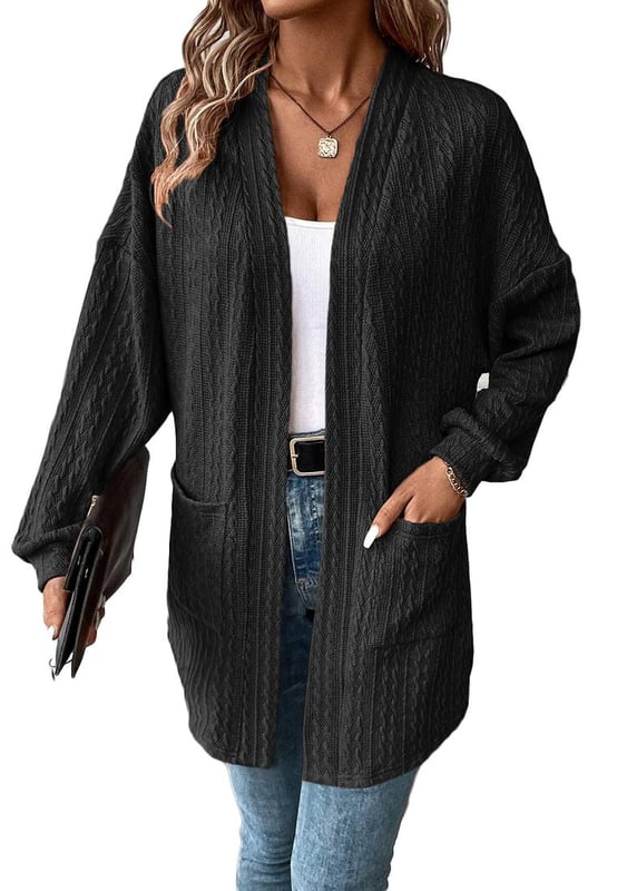 Cardigan Abierto de Punto Texturizado Negro con Bolsillos Laterales  
El punto texturizado combina calidez y moda sin esfuerzo  
Perfecto para la transición entre estaciones  
El cardigan abierto añade un toque chic a cualquier atuendo  
Los bolsillos laterales aportan estilo y practicidad a tu look  
Disponible en múltiples tamaños  
Alta elasticidad para un ajuste cómodo  
Material: 97% Poliéster 3% Elastano