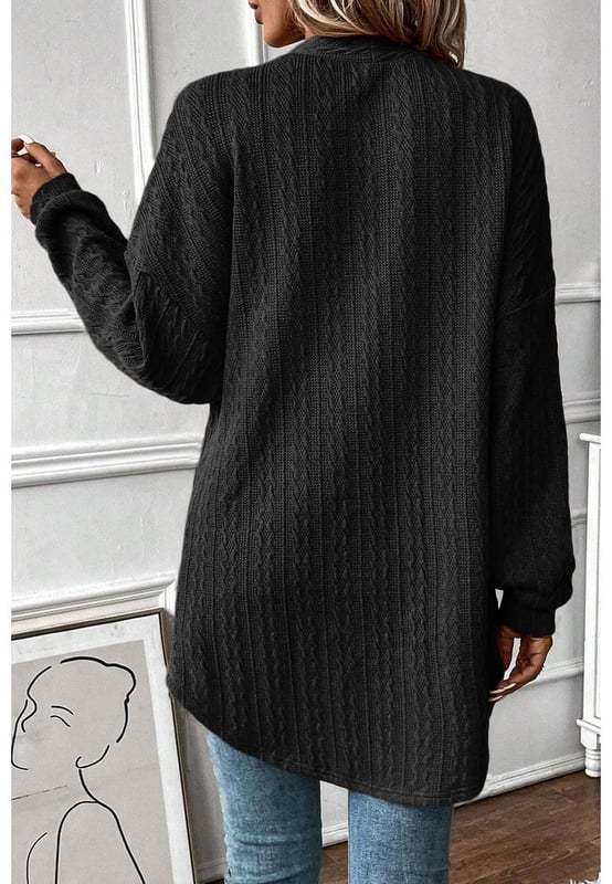Cardigan Abierto de Punto Texturizado Negro con Bolsillos Laterales  
El punto texturizado combina calidez y moda sin esfuerzo  
Perfecto para la transición entre estaciones  
El cardigan abierto añade un toque chic a cualquier atuendo  
Los bolsillos laterales aportan estilo y practicidad a tu look  
Disponible en múltiples tamaños  
Alta elasticidad para un ajuste cómodo  
Material: 97% Poliéster 3% Elastano