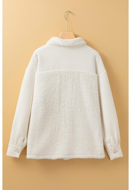 White solid color shacket
  Quilted design adds texture and warmth
  Sherpa lining for cozy comfort
  Button
  up closure for a timeless shirt
  style look
  Versatile styling option
Material: 97% Polyester 3% Elastane