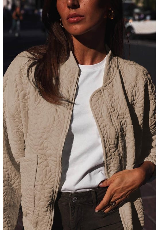 Light French Beige Floral Quilted Jacket
  Woven quilted fabric in a beautiful floral design
  Long sleeves and drop shoulders
  Full zipped closure on the front
  Chic and versatile
  Perfect for adding sophistication to any outfit
  Available in various sizes
  see size chart for your perfect fit
Material: 97% Polyester 3% Elastane