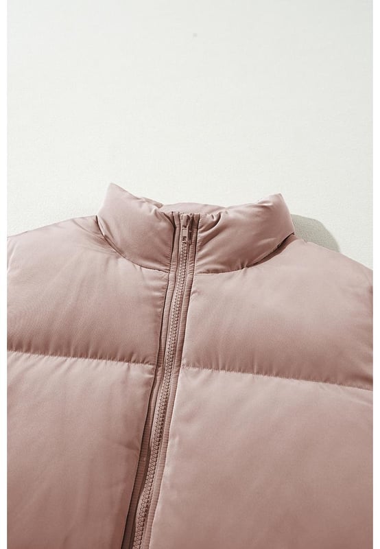 Apricot Pink Full Zipper Quilted Puffer Jacket
  Quilted design for added texture and sophistication
  High neck for extra warmth and trendy look
  Shift style for a flattering and comfortable fit
  Perfect for layering and versatile styling options
Material: 100% Polyester