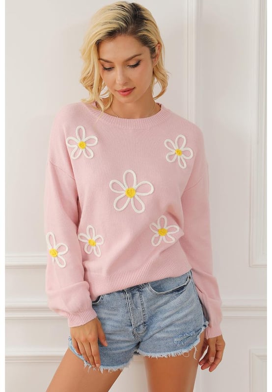 Suéter de Cuello Redondo de Chenille Rosa con Bordado de Margaritas  
Material de chenille de alta calidad  
Hermosos detalles de bordado de margaritas  
Diseño de cuello redondo cómodo y favorecedor  
Versátil para cualquier ocasión