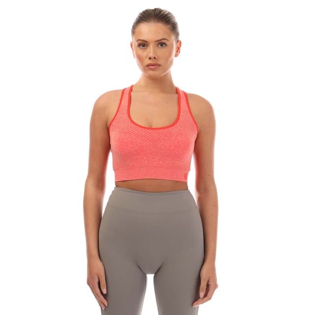 Dare 2b Don`t Sweat It Impact Sport Bra in peach.- Scooped round neck.- Racer back design.- Removable pads.- Medium impact sports bra.- Move Freely with SeamSmart Technology.- Chemical free anti-bacterial odour control treatment.- 67 4% Polyamide  27 8% Polyester  4 8% Elastane.- Ref: DWU354GIG