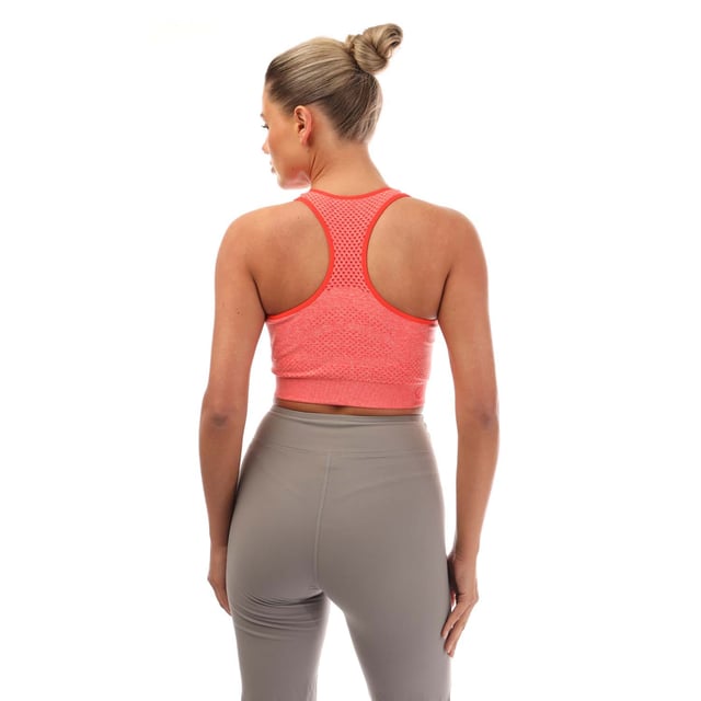 Dare 2b Don`t Sweat It Impact Sport Bra in peach.- Scooped round neck.- Racer back design.- Removable pads.- Medium impact sports bra.- Move Freely with SeamSmart Technology.- Chemical free anti-bacterial odour control treatment.- 67 4% Polyamide  27 8% Polyester  4 8% Elastane.- Ref: DWU354GIG