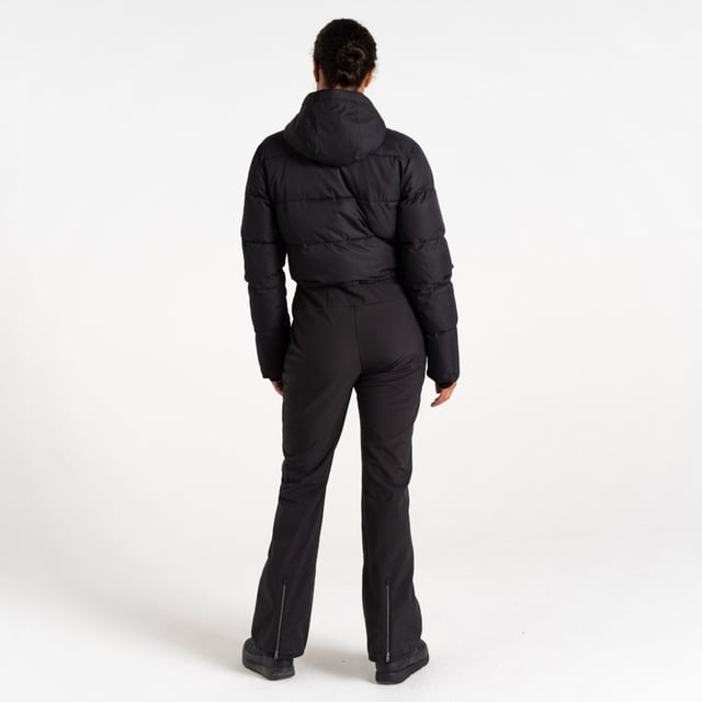 The Dare 2b x Swarovski Flurry Snowsuit, crafted from recycled waterproof and breathable stretch fabric and waterproof softshell, delivers superior protection and agility. The water-repellent finish adds extra coverage. The exposed front zip fastening and grown-on hood with a snug high collar add a modern touch, and the 2-in-1 design provides versatility. You'll stay cosy with the warm inner sleeve cuffs and warm scrim lining to the upper body. Complete with ski features like a ski pass pocket, snow gaiters and a zip gusset at the hem, this ladies snowsuit meets all your skiing needs. You'll make a stylish statement on the slopes with badge and zip pullers embellished with Swarovski crystals.
