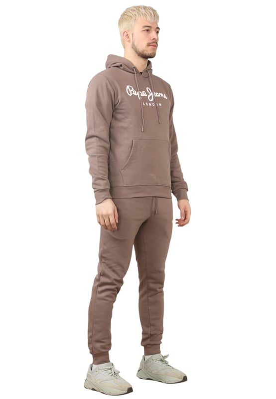 The Pepe Jeans London men's regular fit tracksuit set offers a soft and lightweight hoodie paired with matching joggers. The hoodie features ribbed details on the hood, cuffs, and hem, along with an adjustable hood and a kangaroo pocket for convenience. The joggers come with a waistband drawstring for a secure fit. Both pieces showcase the Pepe Jeans London Big logo on the chest for the hoodie and the small logo on left leg for the joggers. A decorative inner neckband with an all-over logo adds a stylish touch. Made from 100% sustainable cotton, the fabric consists of 65% cotton and 35% polyester. The set is a washable machine for easy maintenance.