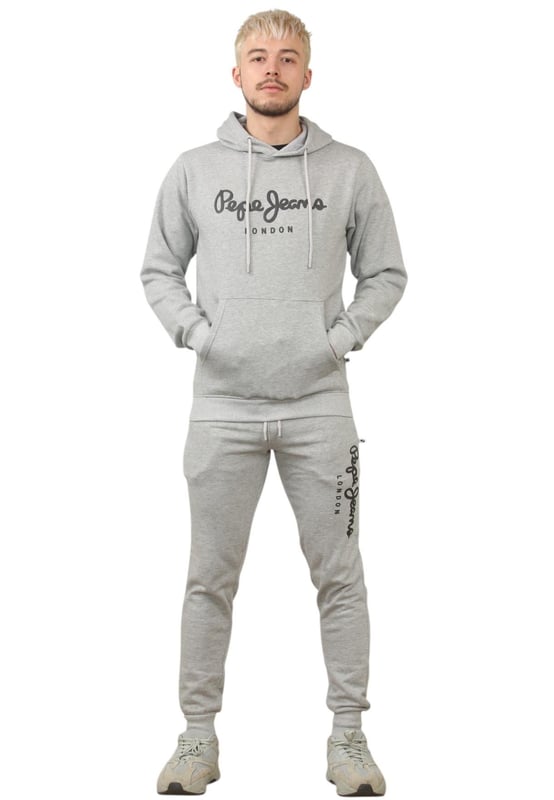 The Pepe Jeans London men's regular fit tracksuit set offers a soft and lightweight hoodie paired with matching joggers. The hoodie features ribbed details on the hood, cuffs, and hem, along with an adjustable hood and a kangaroo pocket for convenience. The joggers come with a waistband drawstring for a secure fit. Both pieces showcase the Pepe Jeans London Big logo on the chest for the hoodie and the left leg for the joggers. A decorative inner neckband with an all-over logo adds a stylish touch. Made from 100% sustainable cotton, the fabric consists of 65% cotton and 35% polyester. The set is a washable machine for easy maintenance.