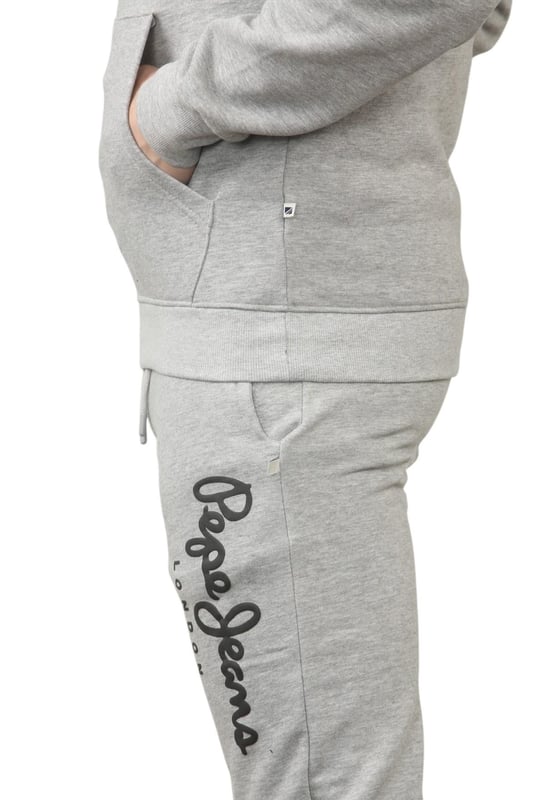 The Pepe Jeans London men's regular fit tracksuit set offers a soft and lightweight hoodie paired with matching joggers. The hoodie features ribbed details on the hood, cuffs, and hem, along with an adjustable hood and a kangaroo pocket for convenience. The joggers come with a waistband drawstring for a secure fit. Both pieces showcase the Pepe Jeans London Big logo on the chest for the hoodie and the left leg for the joggers. A decorative inner neckband with an all-over logo adds a stylish touch. Made from 100% sustainable cotton, the fabric consists of 65% cotton and 35% polyester. The set is a washable machine for easy maintenance.