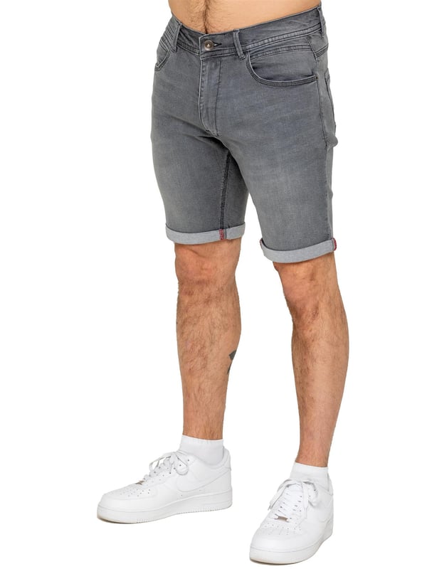 The Enzo Men's Denim Stretch Shorts offer the perfect blend of style and comfort. Designed with a slim fit and crafted from stretch fabric, they provide flexibility and a sleek look. Featuring a classic 5-pocket design, a zip fly fastening, and a turn-up hem for a modern touch, these shorts are a must-have for any casual wardrobe. Ideal for warm-weather styling, they deliver both practicality and effortless fashion.
