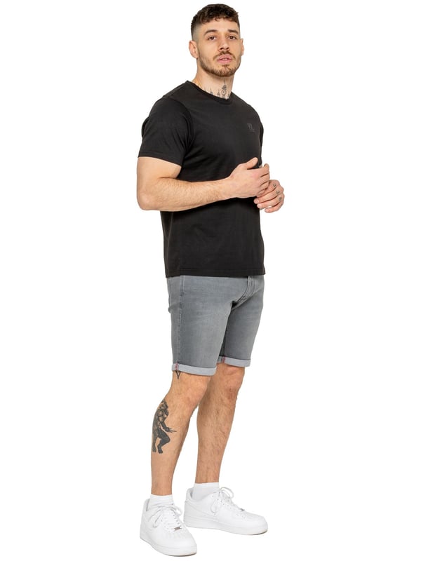 The Enzo Men's Denim Stretch Shorts offer the perfect blend of style and comfort. Designed with a slim fit and crafted from stretch fabric, they provide flexibility and a sleek look. Featuring a classic 5-pocket design, a zip fly fastening, and a turn-up hem for a modern touch, these shorts are a must-have for any casual wardrobe. Ideal for warm-weather styling, they deliver both practicality and effortless fashion.