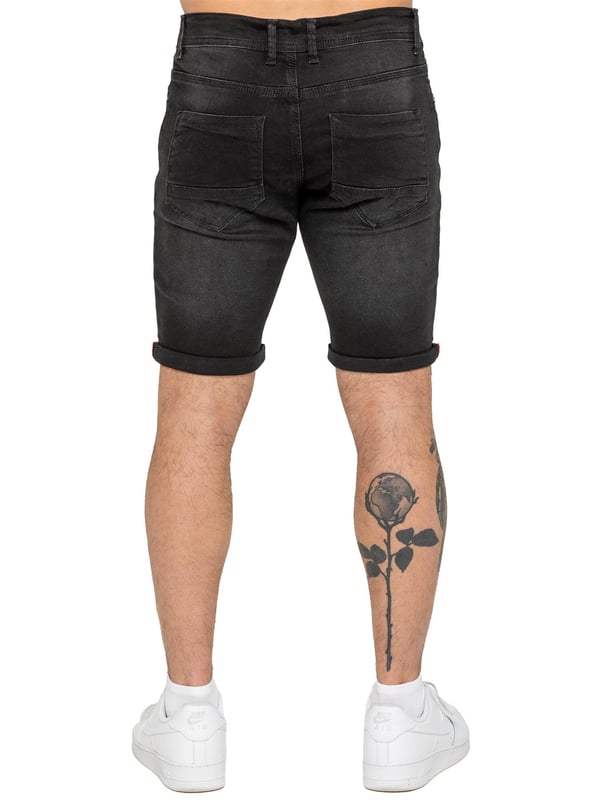 The Enzo Men's Denim Stretch Shorts offer the perfect blend of style and comfort. Designed with a slim fit and crafted from stretch fabric, they provide flexibility and a sleek look. Featuring a classic 5-pocket design, a zip fly fastening, and a turn-up hem for a modern touch, these shorts are a must-have for any casual wardrobe. Ideal for warm-weather styling, they deliver both practicality and effortless fashion.