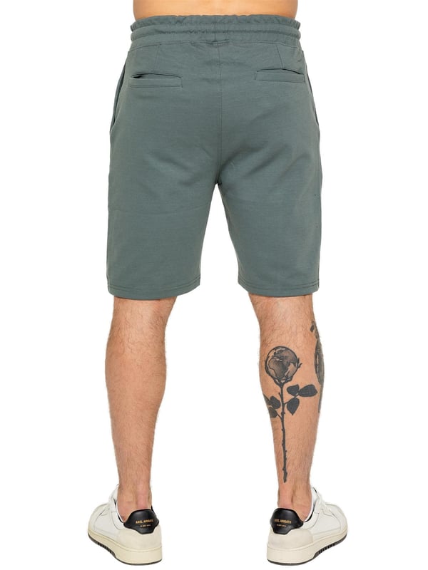 Enzo Mens Casual Stretch Shorts offer comfort and convenience with 2 side & 2 back pockets, elastic waistband & adjustable drawstring, and front pin tuck seam detail for added style and functionality. Perfect for errands or lounging with a practical and stylish design. (617)