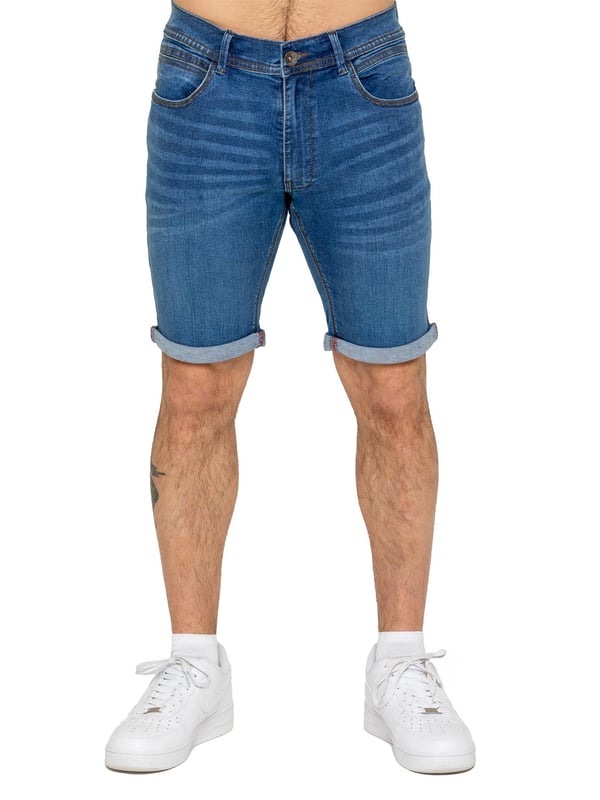 The Enzo Men's Denim Stretch Shorts offer the perfect blend of style and comfort. Designed with a slim fit and crafted from stretch fabric, they provide flexibility and a sleek look. Featuring a classic 5-pocket design, a zip fly fastening, and a turn-up hem for a modern touch, these shorts are a must-have for any casual wardrobe. Ideal for warm-weather styling, they deliver both practicality and effortless fashion.