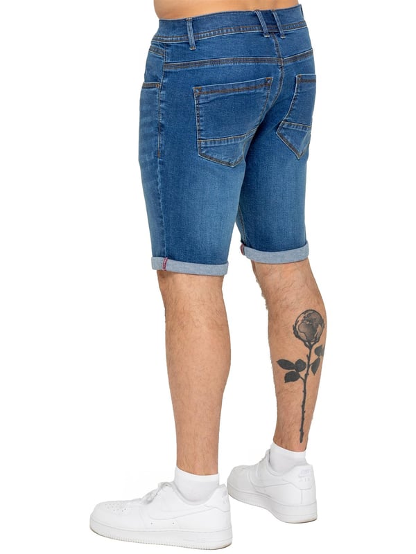 The Enzo Men's Denim Stretch Shorts offer the perfect blend of style and comfort. Designed with a slim fit and crafted from stretch fabric, they provide flexibility and a sleek look. Featuring a classic 5-pocket design, a zip fly fastening, and a turn-up hem for a modern touch, these shorts are a must-have for any casual wardrobe. Ideal for warm-weather styling, they deliver both practicality and effortless fashion.
