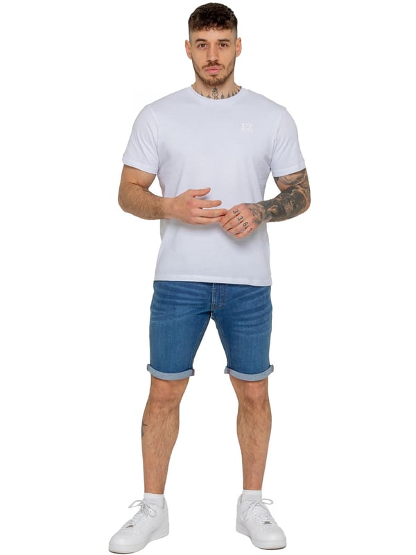 The Enzo Men's Denim Stretch Shorts offer the perfect blend of style and comfort. Designed with a slim fit and crafted from stretch fabric, they provide flexibility and a sleek look. Featuring a classic 5-pocket design, a zip fly fastening, and a turn-up hem for a modern touch, these shorts are a must-have for any casual wardrobe. Ideal for warm-weather styling, they deliver both practicality and effortless fashion.