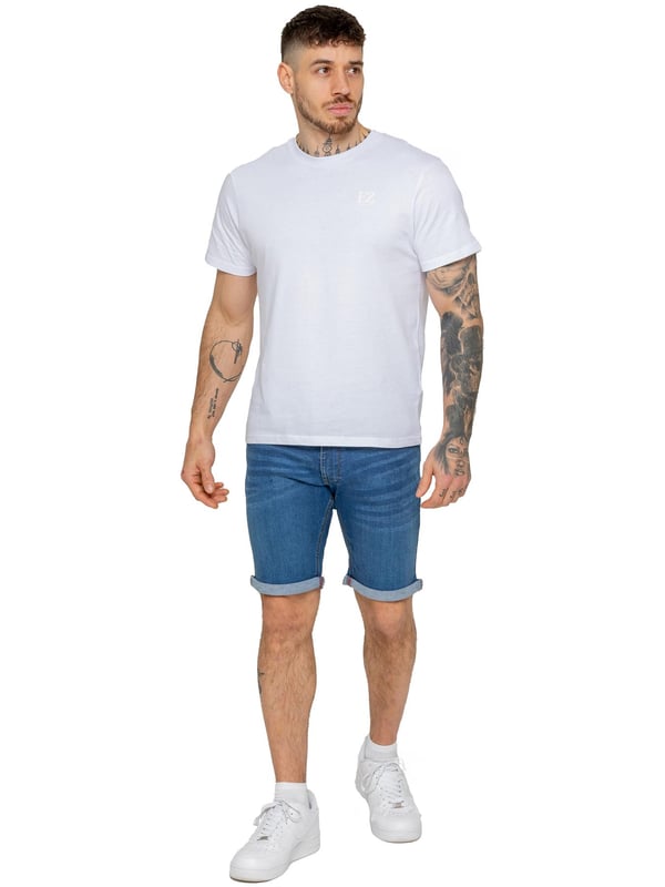 The Enzo Men's Denim Stretch Shorts offer the perfect blend of style and comfort. Designed with a slim fit and crafted from stretch fabric, they provide flexibility and a sleek look. Featuring a classic 5-pocket design, a zip fly fastening, and a turn-up hem for a modern touch, these shorts are a must-have for any casual wardrobe. Ideal for warm-weather styling, they deliver both practicality and effortless fashion.