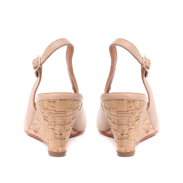 Add a touch of glamour to those occasionwear looks while keeping it comfortable with Zahra, seated on an easy wedge to distribute your weight and slingback strap across the heel to ensure they stay put.