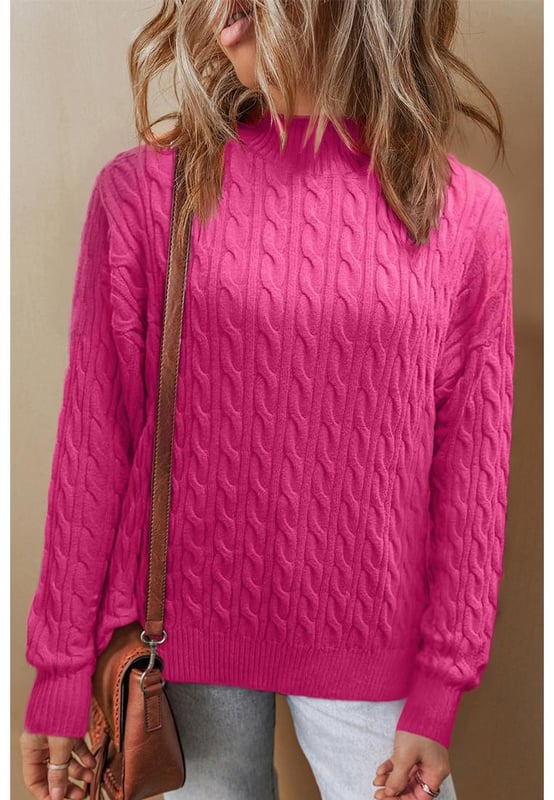 Rojo rosa sólido  
Detalles de punto de cable  
Cuello alto  
Hombro caído  
Silhouette relajada y moderna  
Se puede combinar fácilmente con varios pantalones  
Disponible en múltiples tallas  
Consulta la tabla de tallas para un ajuste preciso  
Material: 50% Viscosa, 28% Poliéster, 22% Poliamida  