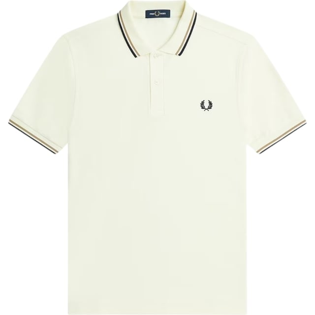 The Twin Tipped Fred Perry Polo Shirt by Fred Perry is a short sleeved polo shirt that has been made from Fred Perry's classic cotton piqué, in a contemporary adaptation of Fred's famous streamlined fit. Available in a diverse range of colourways - each with their own unique story. Featuring the signature Fred Perry wreath logo to the chest and twin tipping to the collar and cuffs.
