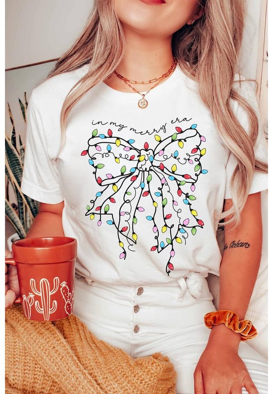 White Colored Light Bowknot Graphic Crewneck T Shirt
  Features a bold bow graphic with colorful lights
  Soft and comfortable material
  Suitable for pairing with jeans or casual pants
  Available in various sizes from S to 3XL