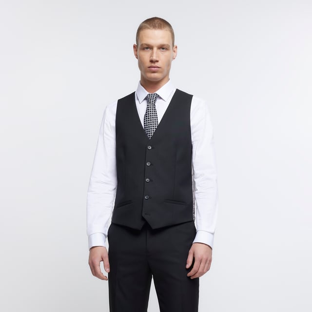 Skinny fit, V-neck, Sleeveless, Front welt pockets, Button fastening, Adjustable back fastening, Part of 3 piece suit, Made with at least 30% recycled polyester