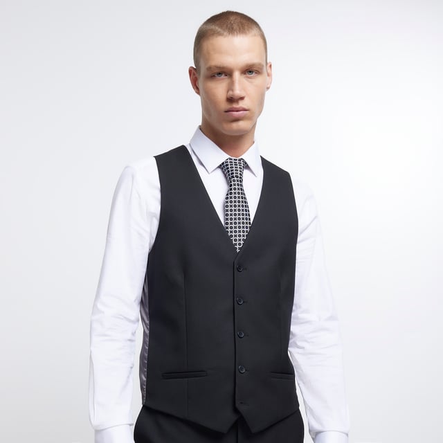 Skinny fit, V-neck, Sleeveless, Front welt pockets, Button fastening, Adjustable back fastening, Part of 3 piece suit, Made with at least 30% recycled polyester