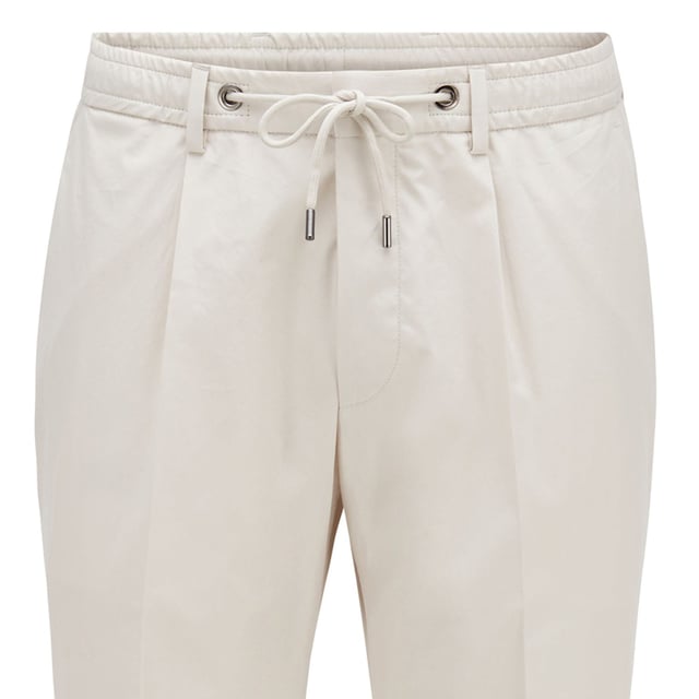 Mens Boss Bardon Trousers in natural.- Elasticated waistband with drawstring fastening.- 4 pockets.- Slim fit.- Ref: 50440093102