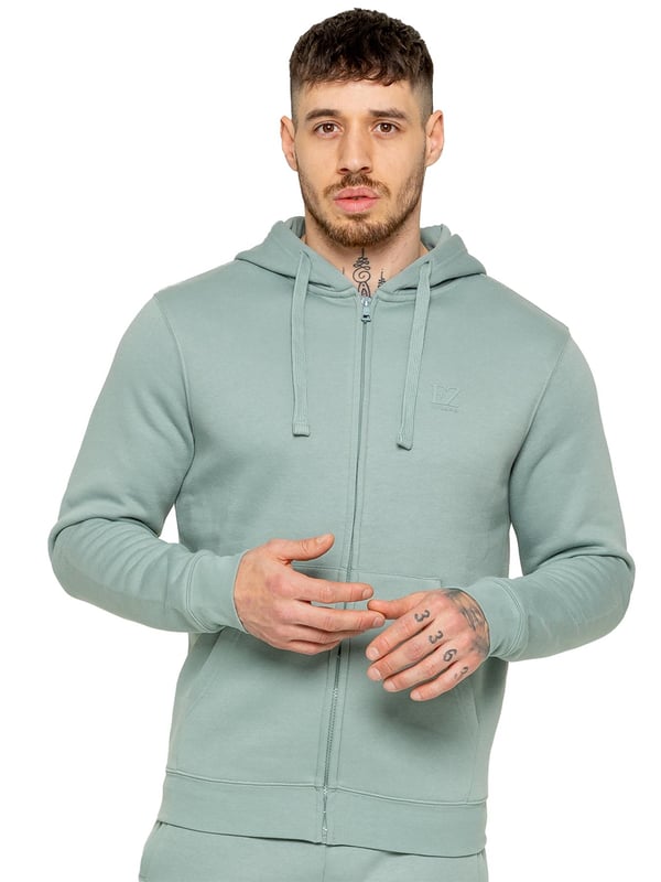 Be ready to conquer any day in the Enzo Mens Zip Hoodie Tracksuit Set. With its comfortable regular fit, long sleeve zip hoodie with cuffed wrists, and adjustable drawstrings, this set will have you looking and feeling your best. The joggers feature the iconic EZ logo and also have a regular fit with cuffed legs and an elasticated waistband with a drawstring for a custom fit. The set is functional with 2 side slash pockets and a single welt back pocket, making it perfect for both casual and work wear.