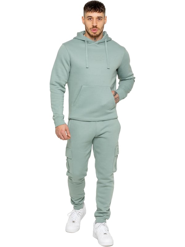 Enzo Mens Overhead Hoodie Tracksuit Set. Regular Fit, Long Sleeve Hoodie with Cuffed Wrists and Adjustable Drawstrings. Features EZ Logo On Chest And Joggers. Regular Fit Cargo Jogger. Elasticated Waistband With Adjustable Drawstring. Features 2 Side Slash Pockets, 2 Cargo Pockets, Single Welt Back Pocket. Ideal to use for Casual and Work wear.