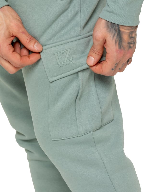Enzo Mens Overhead Hoodie Tracksuit Set. Regular Fit, Long Sleeve Hoodie with Cuffed Wrists and Adjustable Drawstrings. Features EZ Logo On Chest And Joggers. Regular Fit Cargo Jogger. Elasticated Waistband With Adjustable Drawstring. Features 2 Side Slash Pockets, 2 Cargo Pockets, Single Welt Back Pocket. Ideal to use for Casual and Work wear.